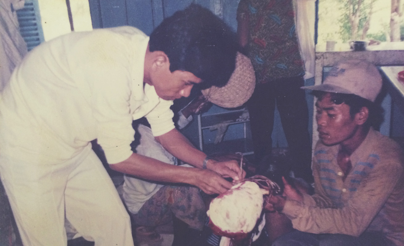 Dr. Samnang attending to someone